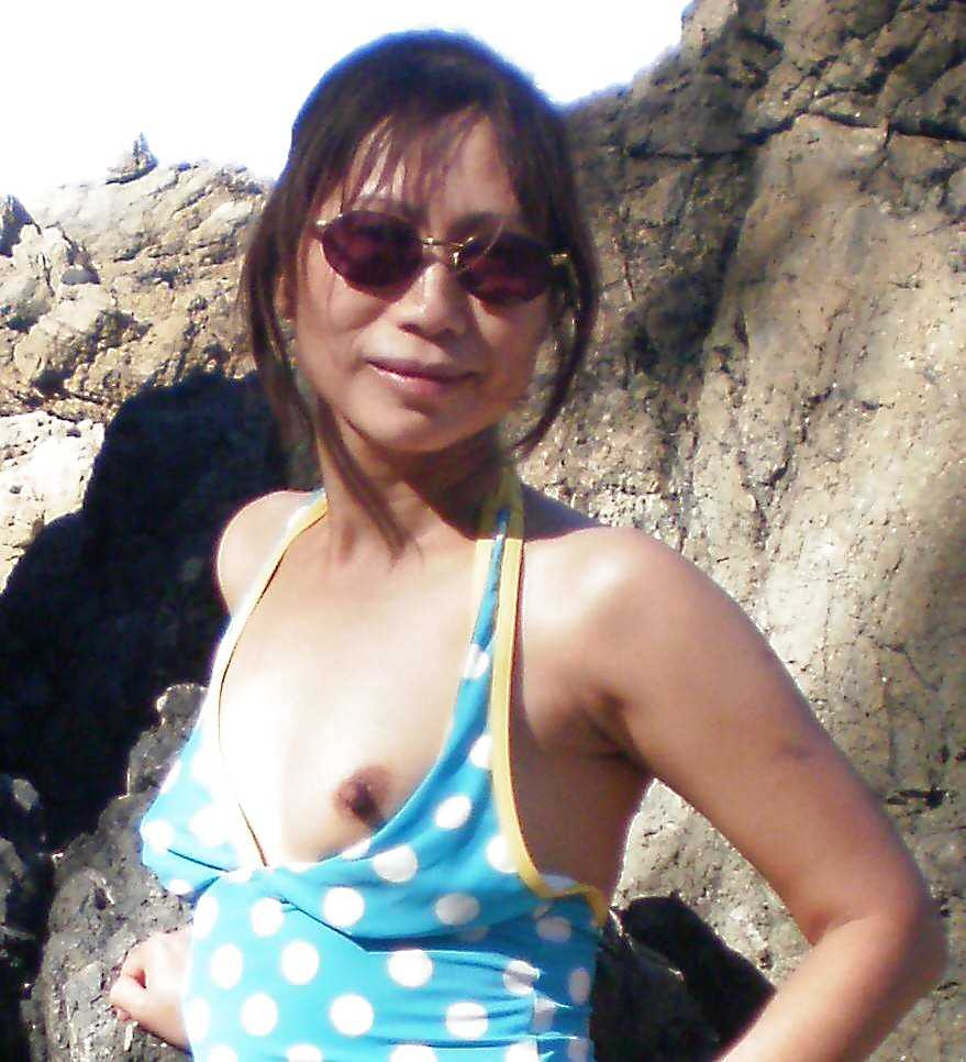 Very horny Asian milf, beach vacation