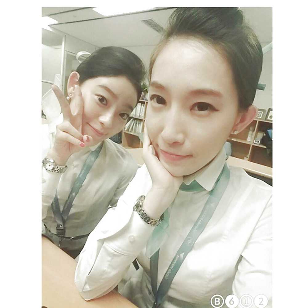 Korean air hostess takes self pics