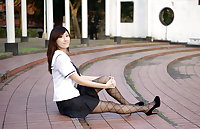 Asian women in heels, boots and pantyhose 3